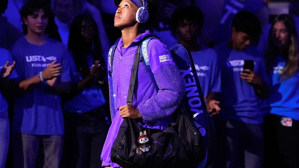 FILE - Naomi Osaka, of Japan, walks on the court for her women's singles semifinals of the U.S. Open tennis championships in New York, Sept. 4, 2025.