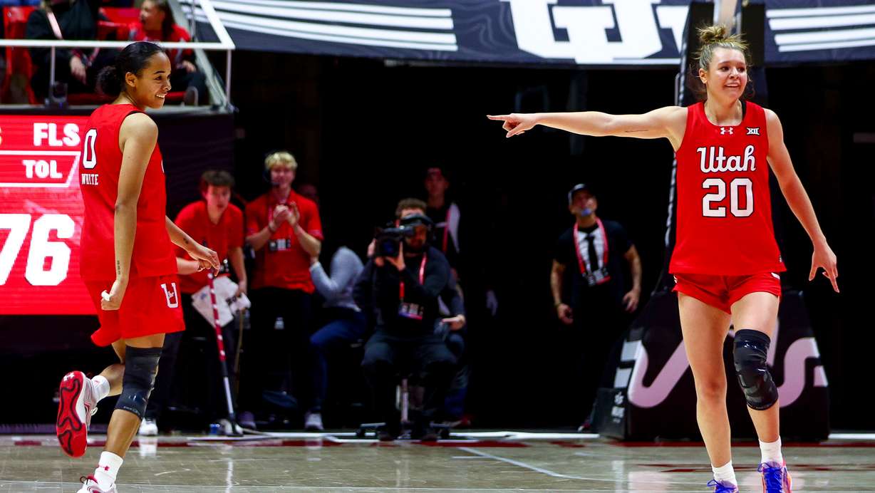 Utah forward Reese Ross (20) points to guard Lani White (0) after White hit a 3-pointer during the second half of a women’s basketball game against the TCU Horned Frogs at the Huntsman Center in Salt Lake City on Saturday, Jan. 3, 2026.
