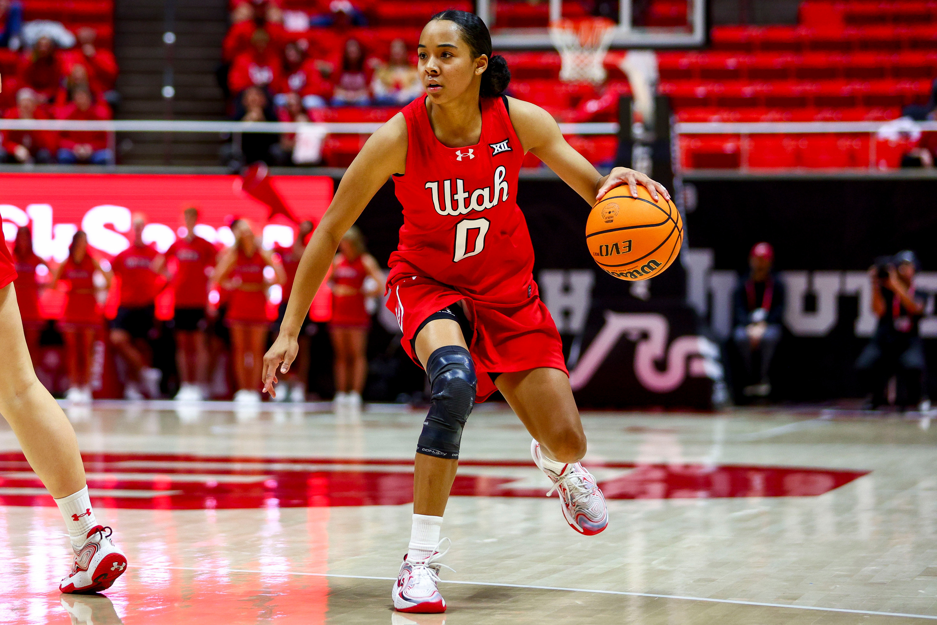 Utah women go scoreless over last 5 minutes, hold on to defeat Kansas