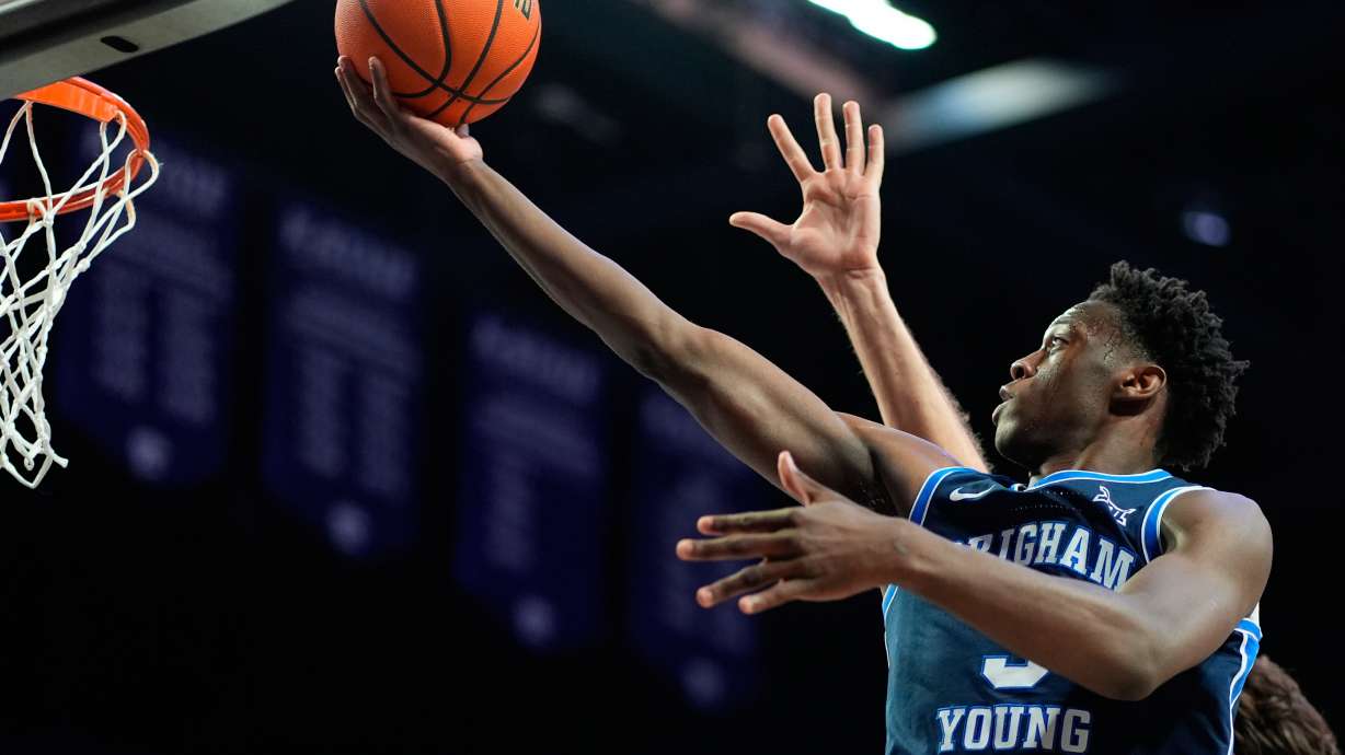 BYU forward AJ Dybantsa shoots during the first half of an NCAA college basketball game against Kansas State, Saturday, Jan. 3, 2026, in Manhattan, Kan.