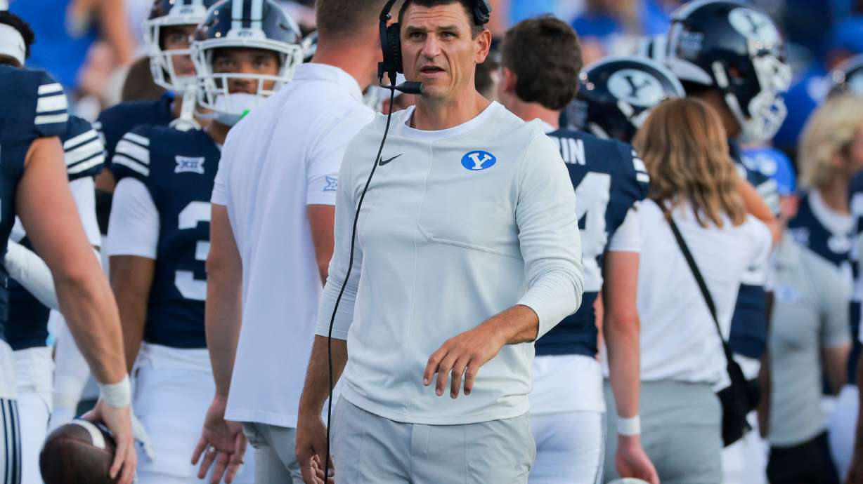 Brigham Young special teams coordinator and defensive ends coach Kelly Poppinga looks on during the game against the Portland State Vikings at LaVell Edwards Stadium in Provo on Saturday, Aug. 31, 2025.