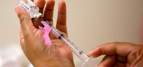 Flu season surged in the US over the holiday and already rivals last winter's harsh epidemic
