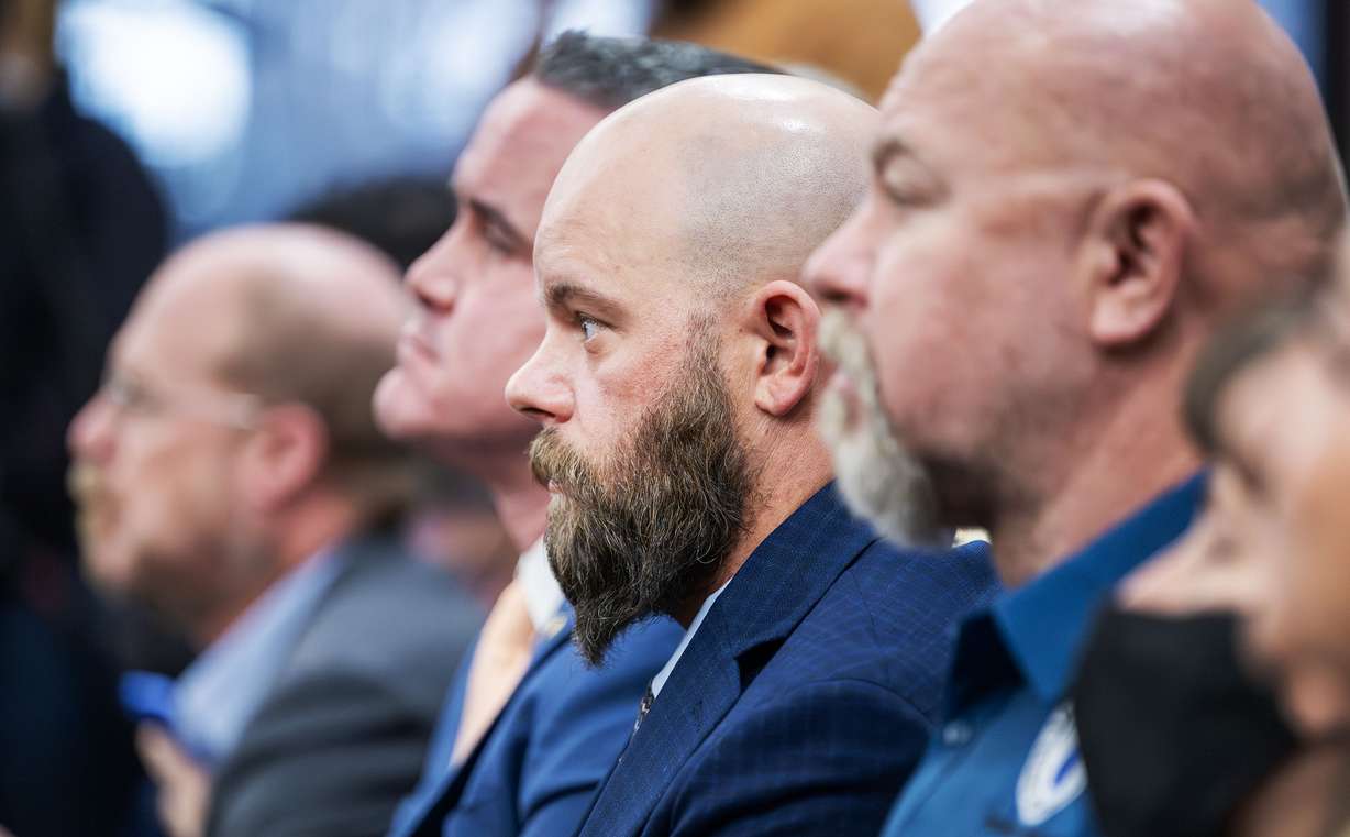 Nicholas Booth and other audience members listen as the Utah judiciary launches a new veterans court to support former service members in the justice system at a ceremony in the 2nd District Court in Ogden on Monday.