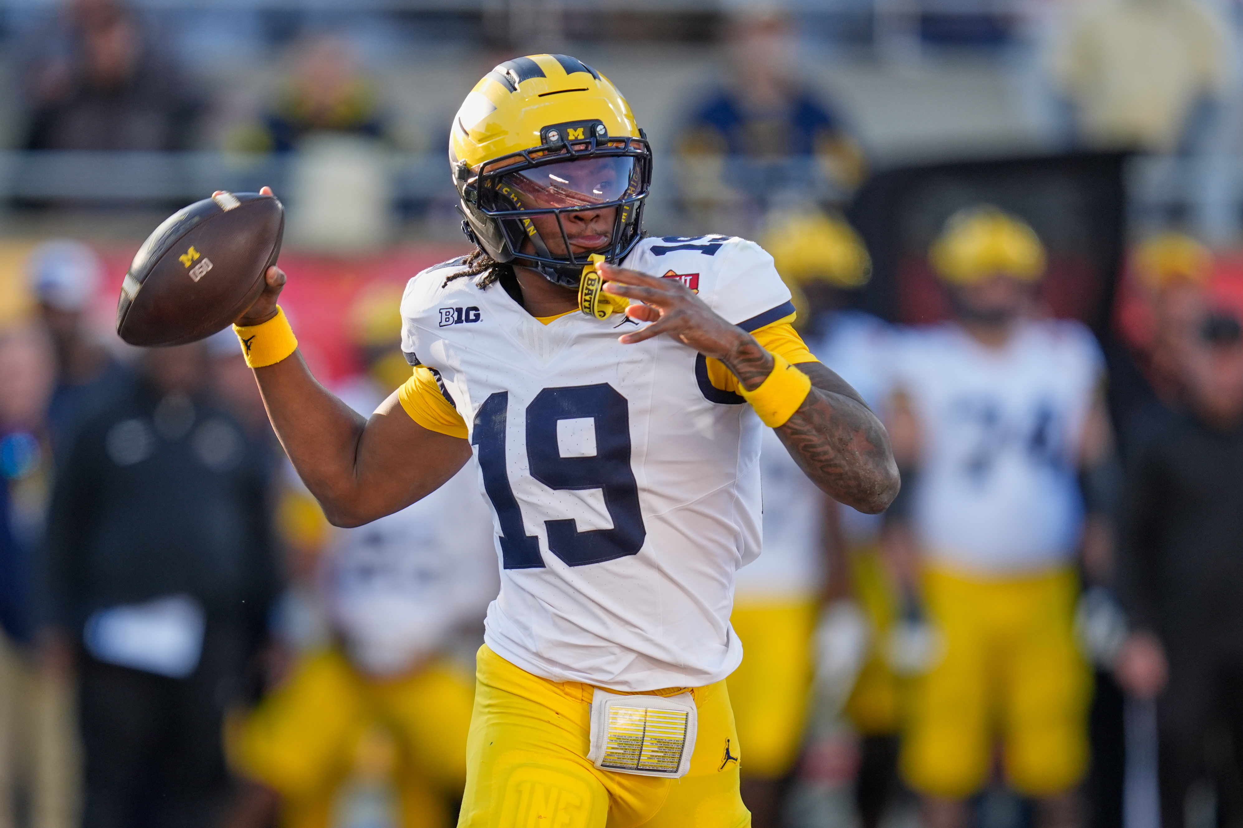 Michigan quarterback Bryce Underwood (19) throws a pass during the first half of the Citrus Bowl NCAA college football game, Wednesday, Dec. 31, 2025, in Orlando, Fla.