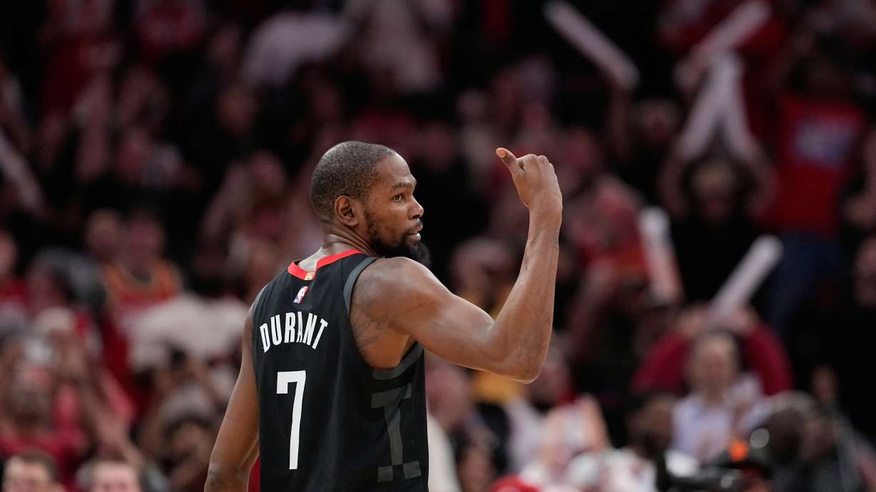 Houston Rockets' Kevin Durant (7) celebrates after making a game-winning 3-point basket against the Phoenix Suns during the second half of an NBA basketball game Monday, Jan. 5, 2026, in Houston.