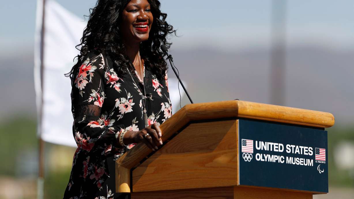 FILE - Benita Fitzgerald Mosley, a U.S. Olympic gold medalist, speaks during a ceremonial groundbreaking for a new Olympic museum June 9, 2017, in Colorado Springs, Colo.