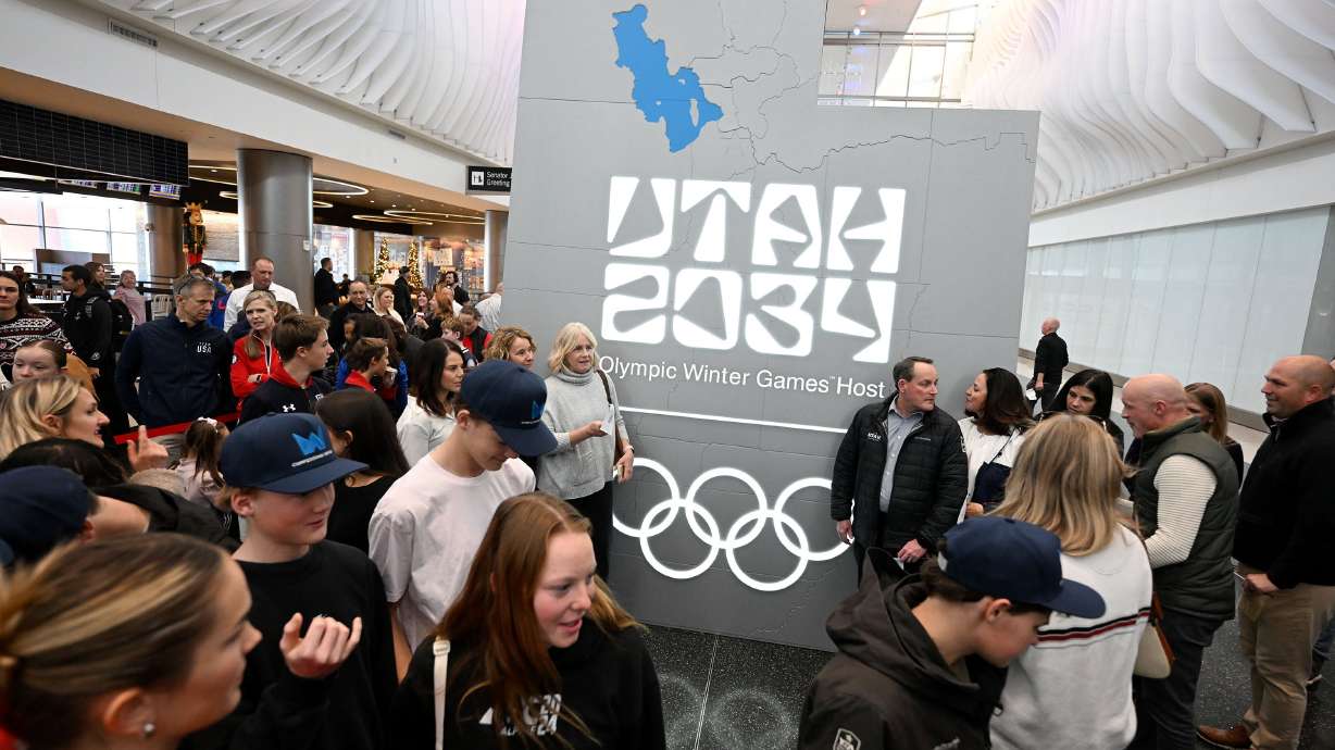 The Organizing Committee for the 2034 Olympic and Paralympic Winter Games, state leaders and former athletes gather to celebrate 3,000 days until the 2034 Winter Olympics during a ceremony at the Salt Lake City International Airport on Nov. 24.