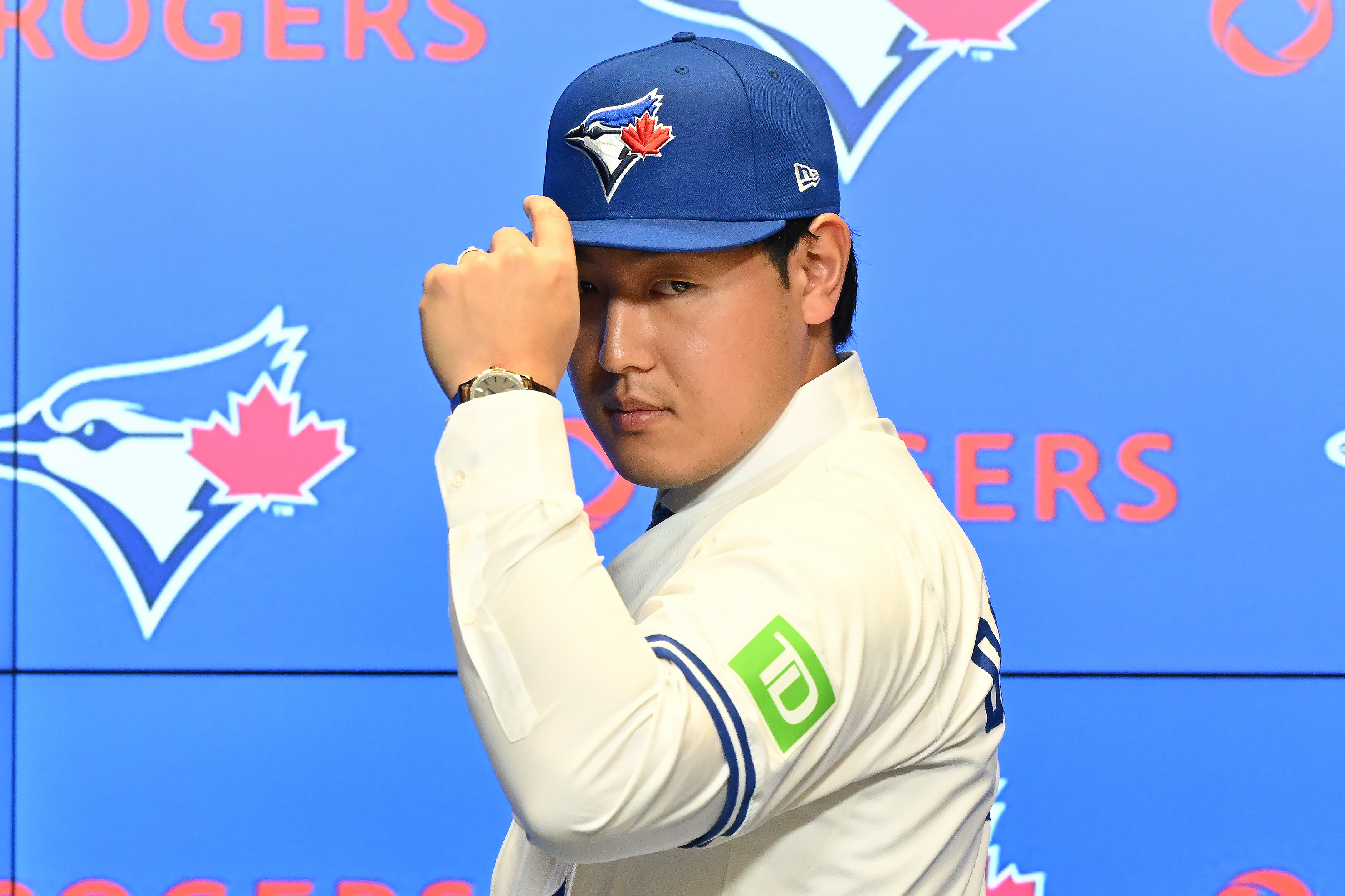 Toronto Blue Jays' Kazuma Okamoto poses during an introductory press conference at Rogers Centre in Toronto, Canada, on Tuesday, Jan. 6, 2026.