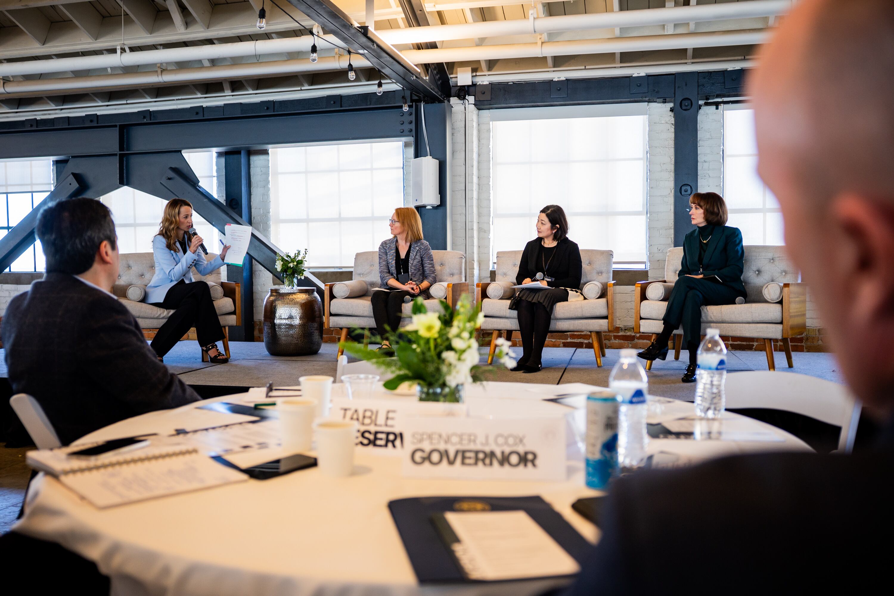 Gov. Spencer Cox, front right, watches as first lady Abby Cox, back left, moderates an early literacy and family guidelines discussion including Tami Austin, acting early learning program manager with the Salt Lake County Library system, Seung-Hee Claire Son, associate professor of educational psychology at the University of Utah, and Sydnee Dickson, clinical professor in the department of educational leadership and policy at the University of Utah, from left to right, during a Literacy and Reading Symposium hosted by the governor at The Monarch in Ogden on Tuesday.