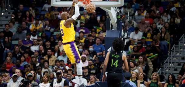 James and Doncic each score 30 to help the Lakers hold off the Pelicans 111-103