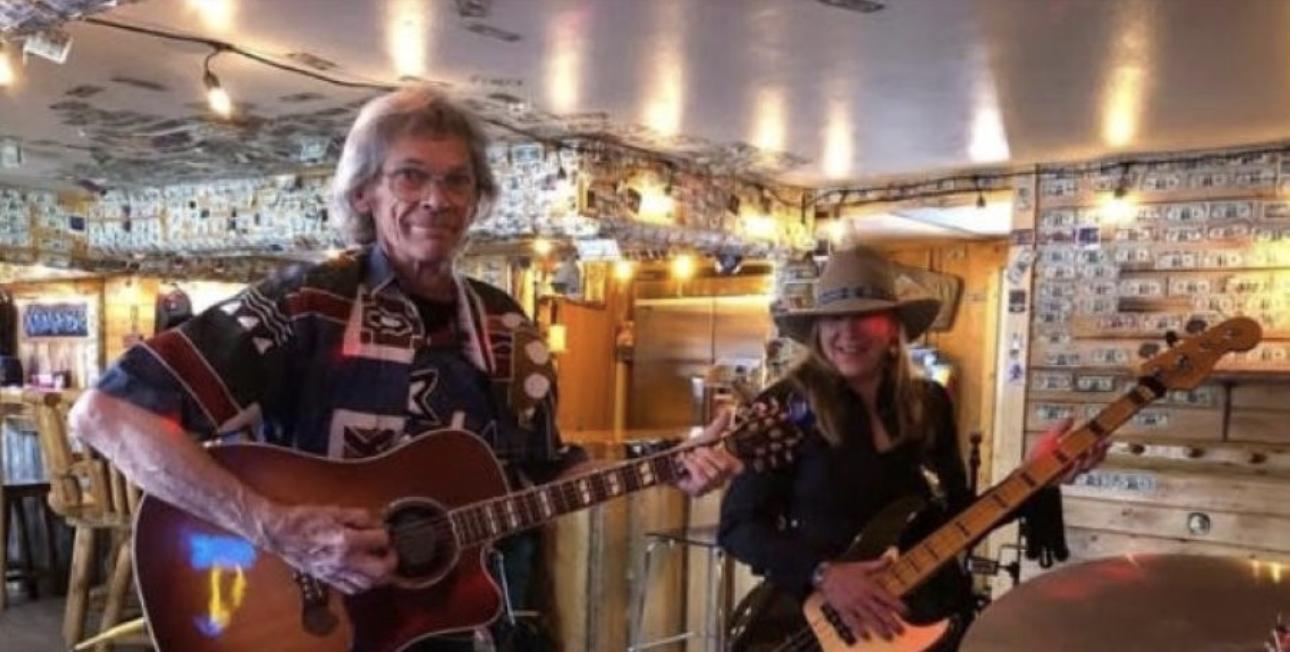 Local musicians and Boondocks founders Pat and Nancy Doyle perform music at Island Park’s Shotgun Bar. The restaurateurs were rarely photographed working at Boondocks, as they were too busy running the kitchen and dining room.