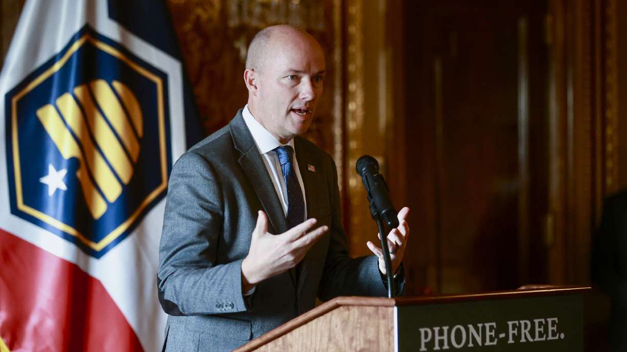 Utah Gov. Spencer Cox speaks during a press conference regarding plans to further limit phone use in schools held in the gold room of the Capitol in Salt Lake City on Wednesday.
