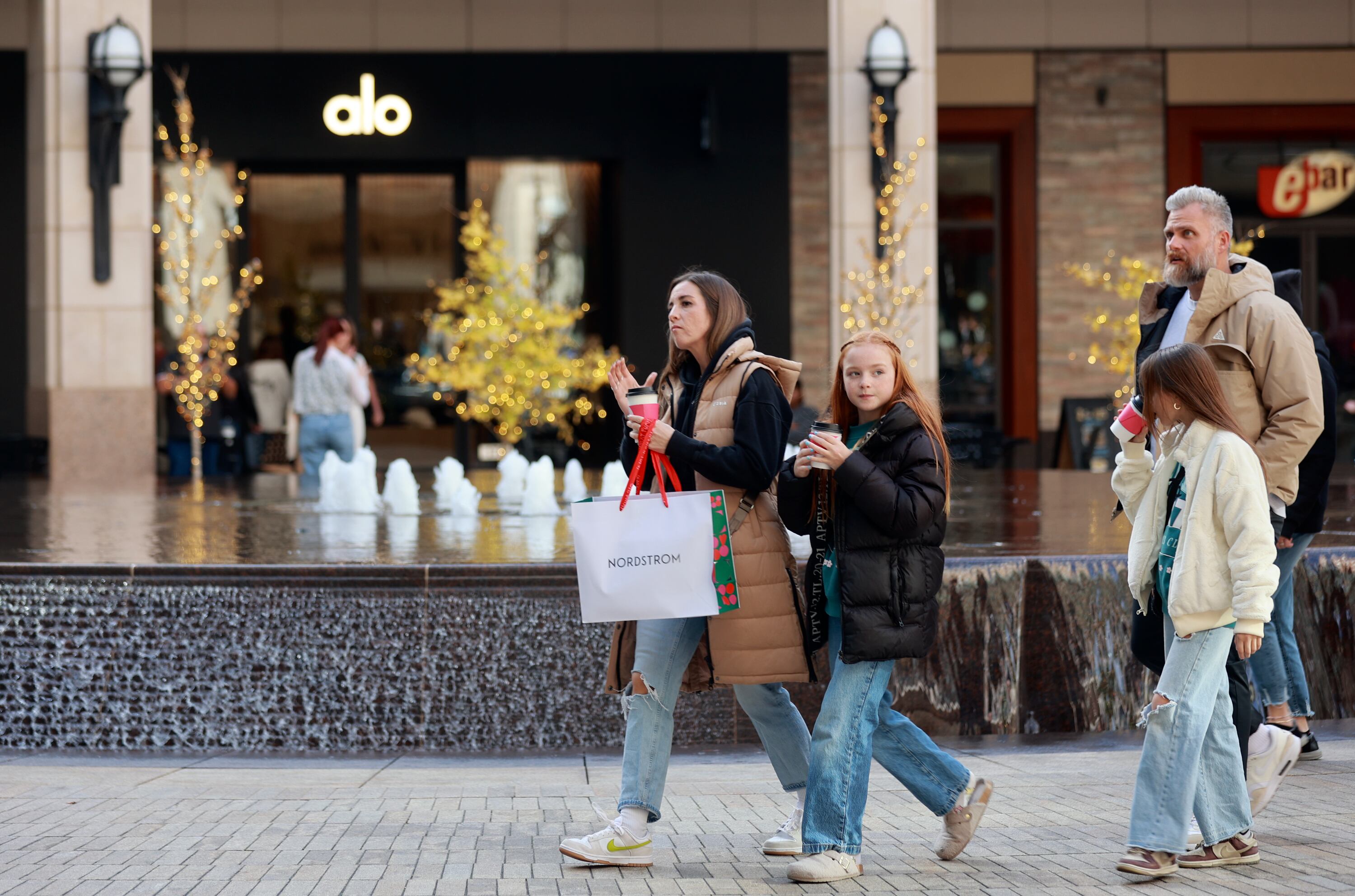 People shop on Black Friday at City Creek Center in Salt Lake City on Nov. 28, 2025.