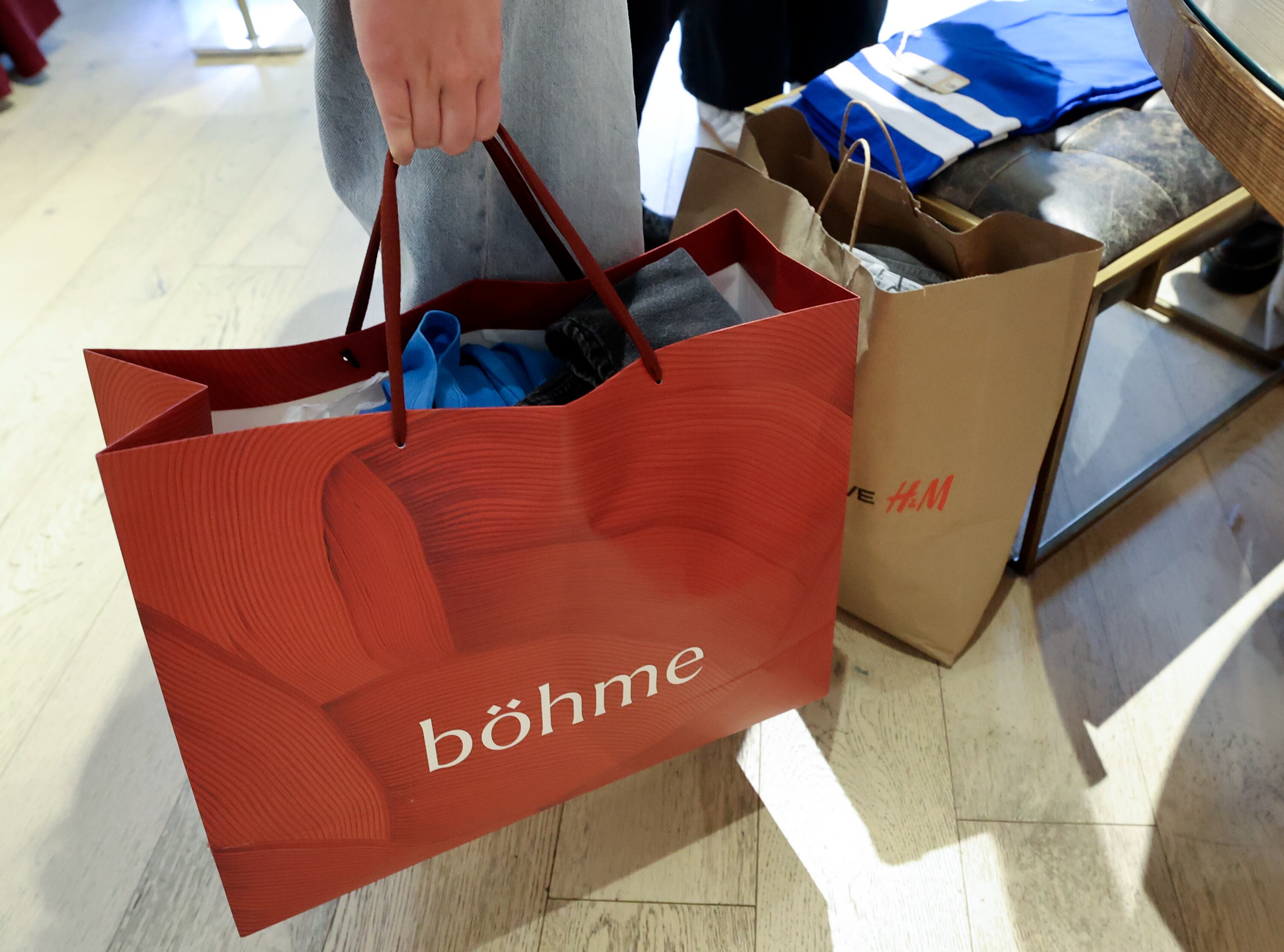 A customer shops on Black Friday at City Creek Center in Salt Lake City on Nov. 28, 2025.
