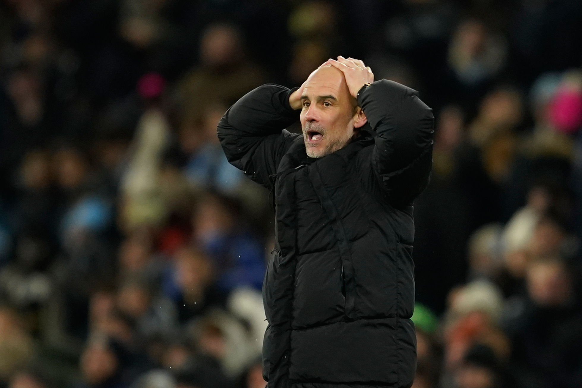 Manchester City head coach Pep Guardiola reacts after Erling Haaland missed a scoring opportunity during the English Premier League soccer match between Manchester City and Brighton and Hove Albion in Manchester, England, Wednesday, Jan. 7, 2026.