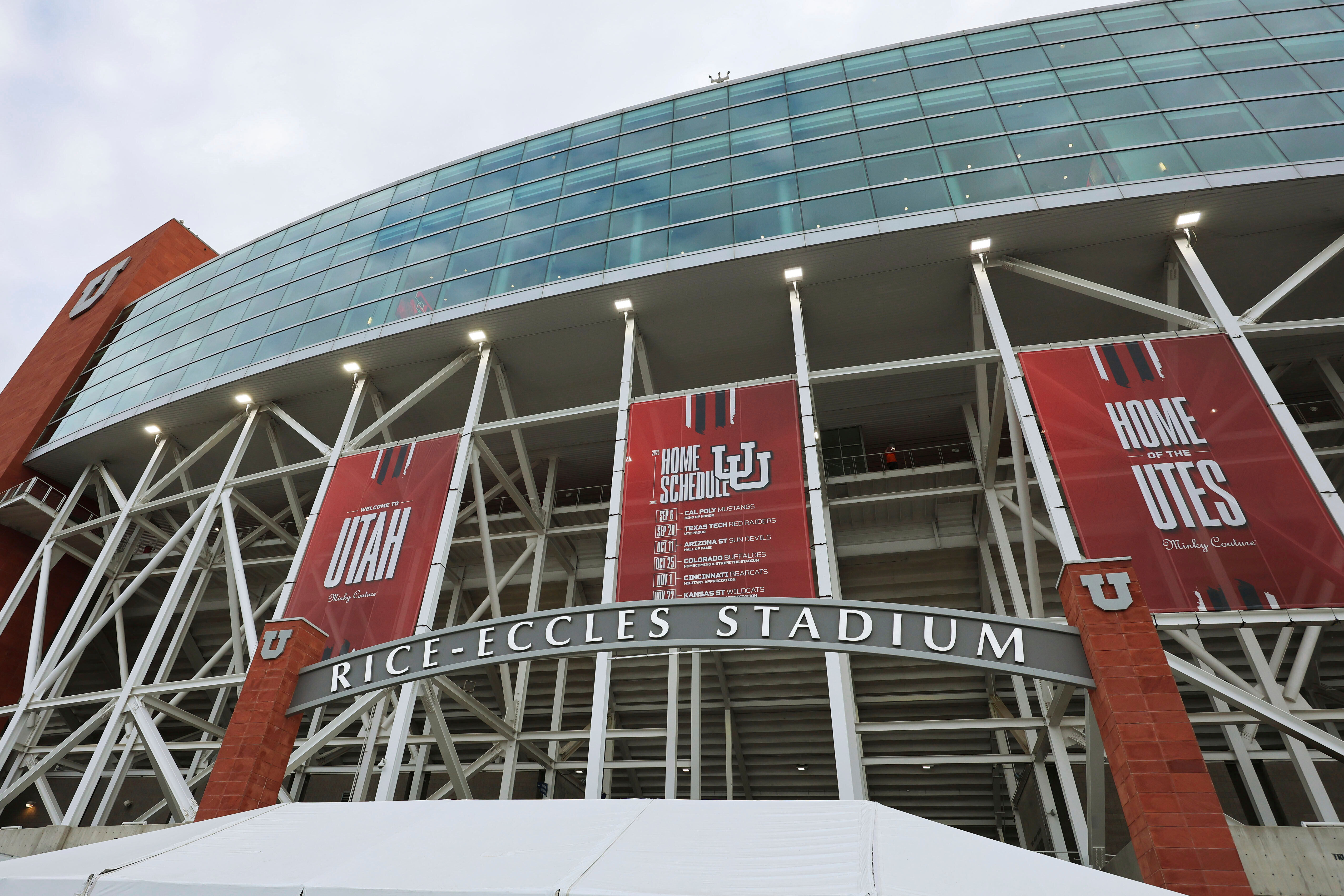 FILE - Banners hang outside Rice Eccles Stadium during an NCAA college football game Sept. 20, 2025, in Salt Lake City, Utah.