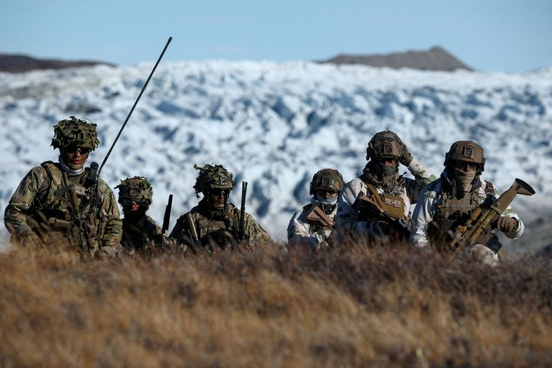 Danish troops practice looking for potential threats during a military drill as Danish, Swedish and Norwegian home guard units together with Danish, German and French troops take part in joint military drills in Kangerlussuaq, Greenland, Sept. 17. European leaders stood in solidarity with Greenland on Wednesday.