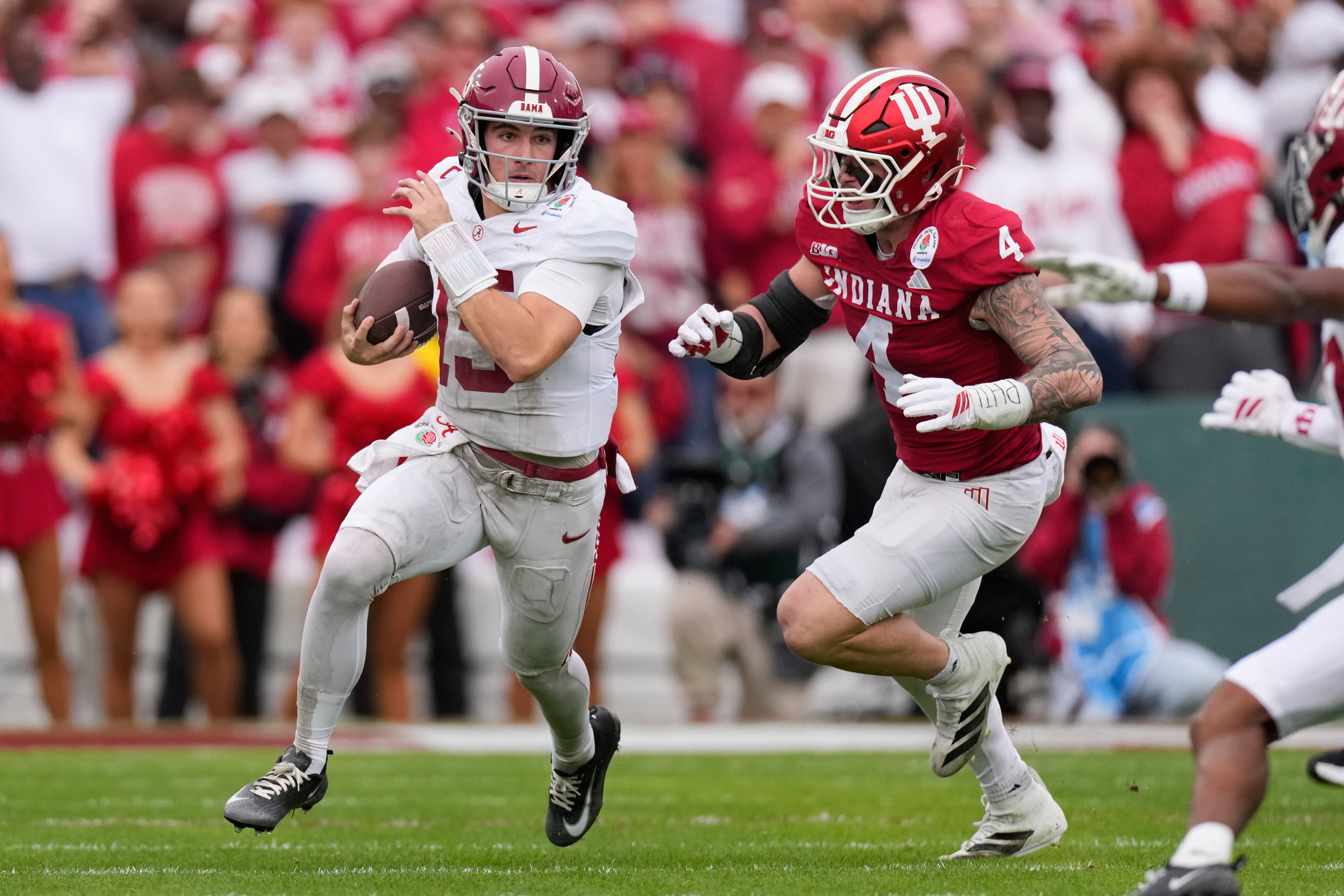 Alabama quarterback Ty Simpson (15) is chased by Alabama linebacker Qua Russaw (4) during the first half of the Rose Bowl College Football Playoff quarterfinal game Thursday, Jan. 1, 2026, in Pasadena, Calif.