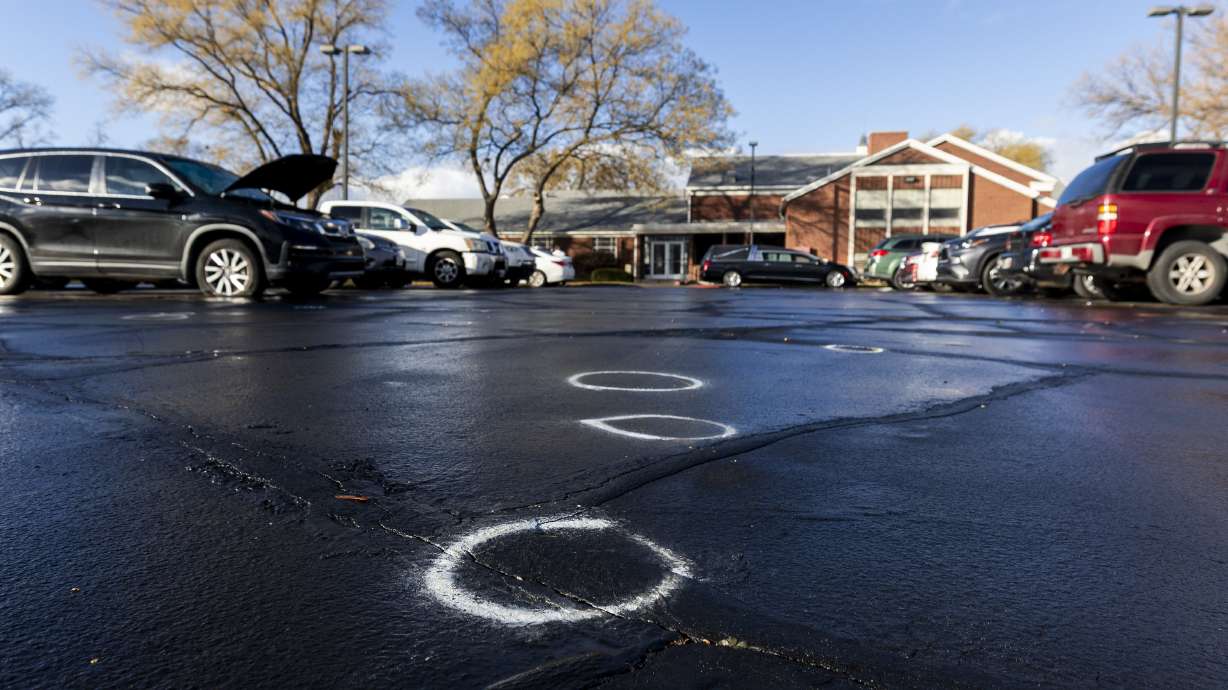 Circles made with spray paint remain outside a church meetinghouse at 660 N. Redwood Road in Salt Lake City on Jan. 8. A shooting occurred the night before at the building when a funeral was taking place.