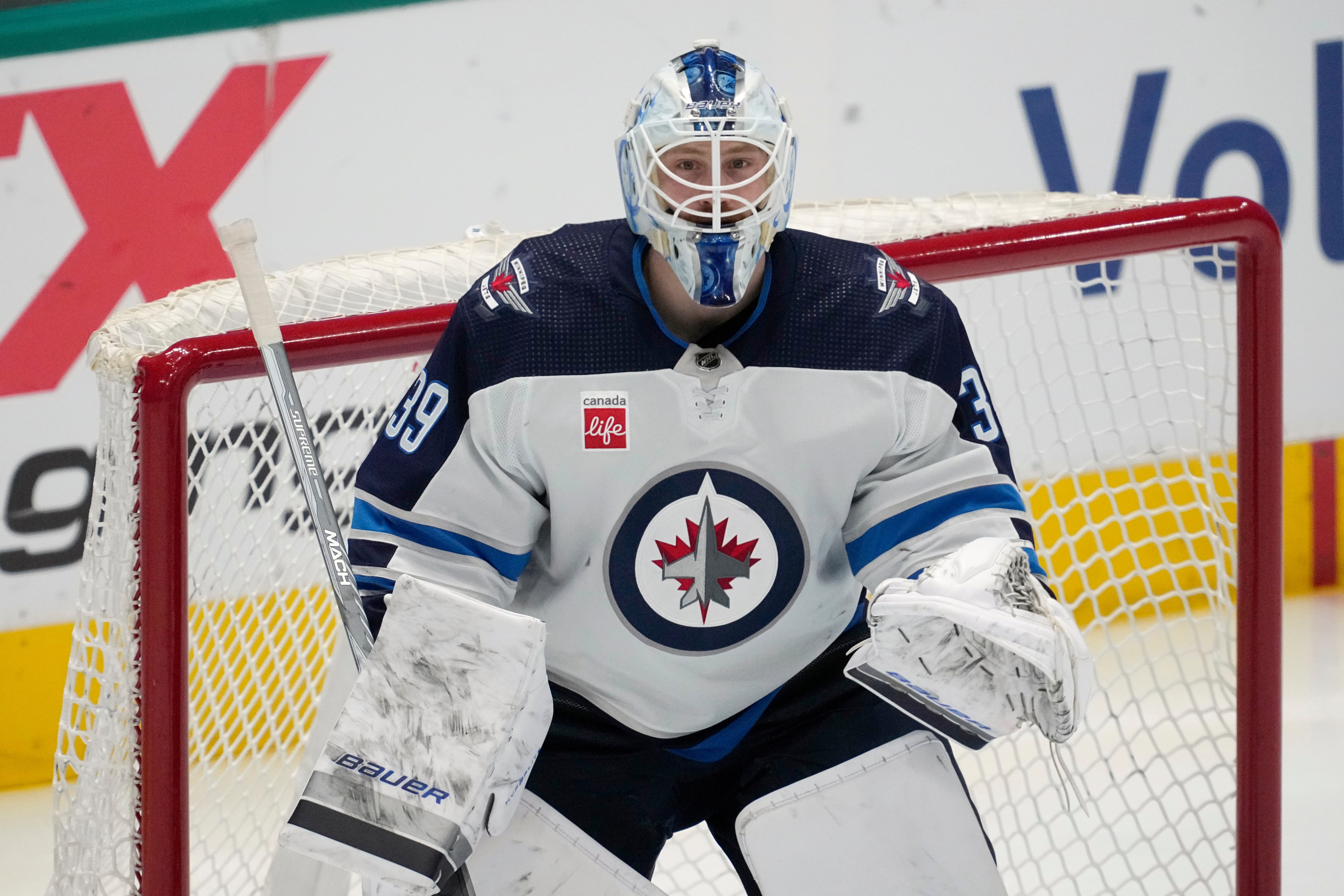 FILE - Winnipeg Jets goaltender Laurent Brossoit minds the net during an NHL hockey game against the Dallas Stars in Dallas, April 11, 2024.