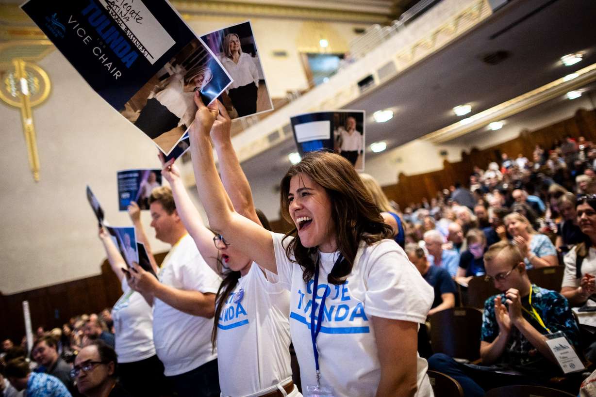 Audrey Evans, a state delegate from Salt Lake County, cheers for Dr. Tulinda Larsen, a candidate for vice chair of the Utah Democratic Party, during the 2025 Utah State Democratic Party Organizing Convention at Ogden High School in Ogden on May 31, 2025.