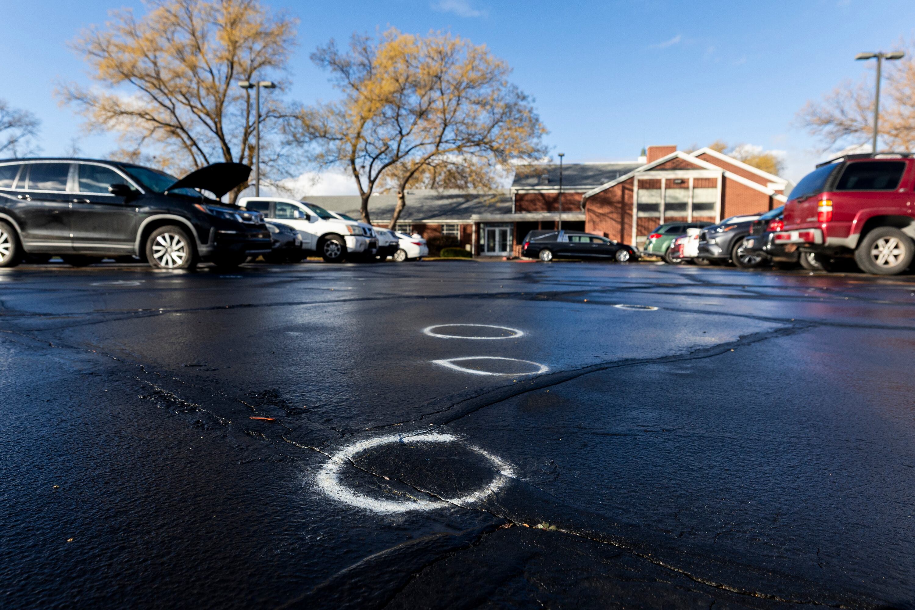 Circles made with spray paint remain outside a meetinghouse of The Church of Jesus Christ of Latter-day Saints at 660 N. Redwood Rd. in Salt Lake City on Thursday, Jan. 8, 2026. A shooting occurred the night before at the building when a funeral was taking place.