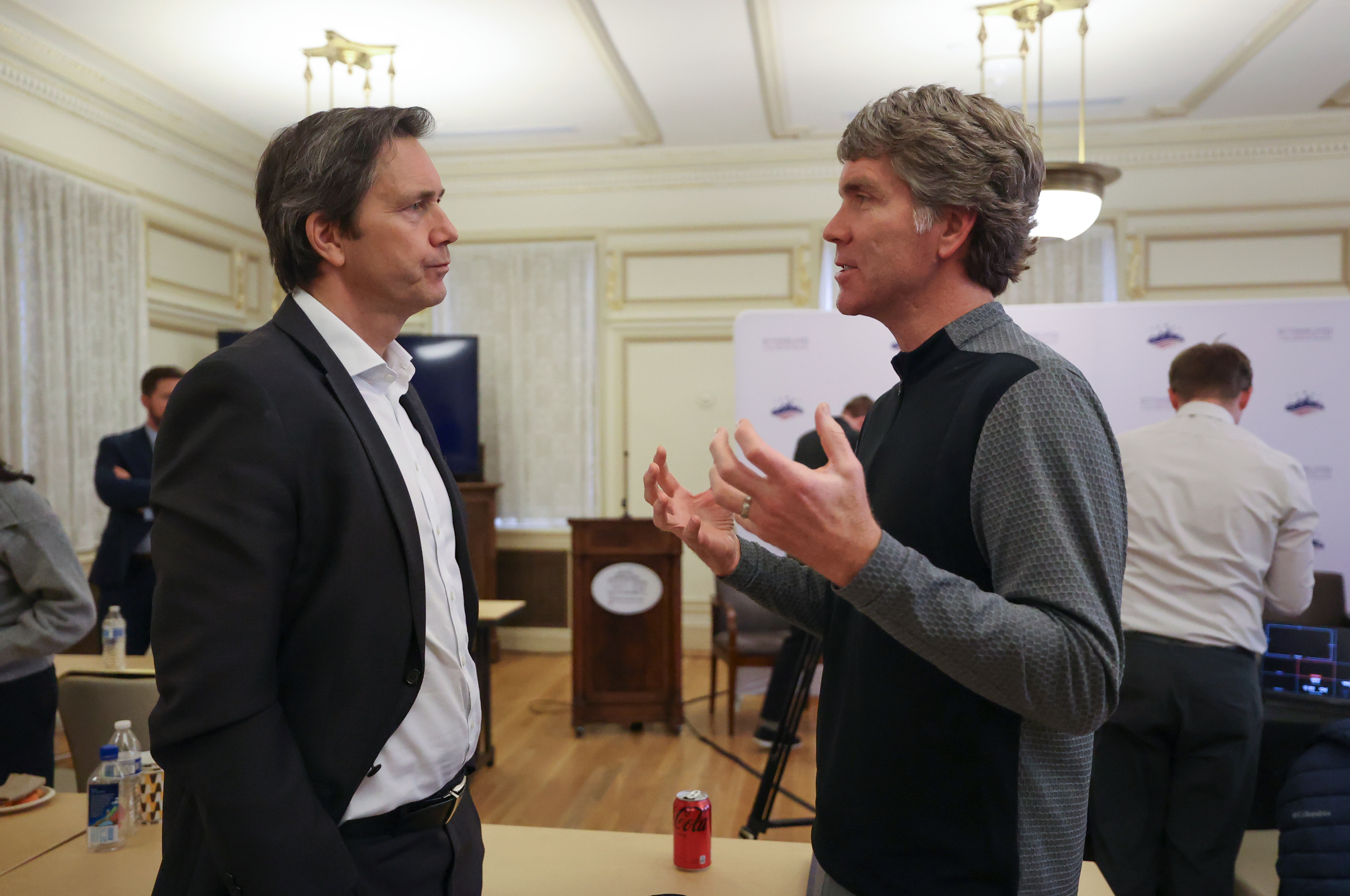 Richard Reeves, American Institute for Boys and Men president, talks with Kreg Edgmon, WeYouth.org founder, at the Men and Boys Well-being Symposium, hosted by the Sutherland Institute, at the Thomas S. Monson Center in Salt Lake City on Thursday. A new survey showed one-third of American men feel disconnected from society.