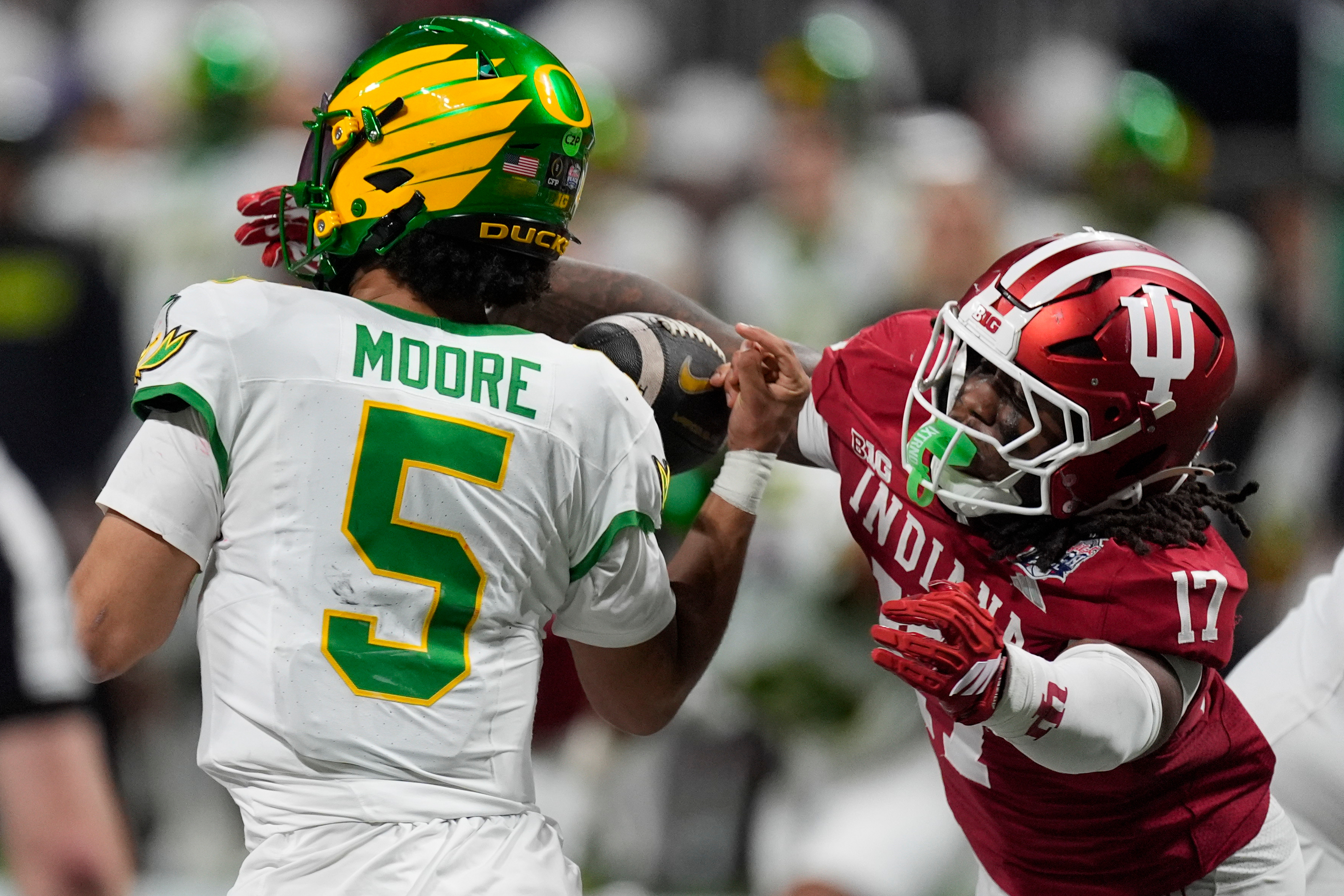 Dante Moore and the Oregon Ducks self-destruct in 56-22 Peach Bowl loss to No. 1 Indiana