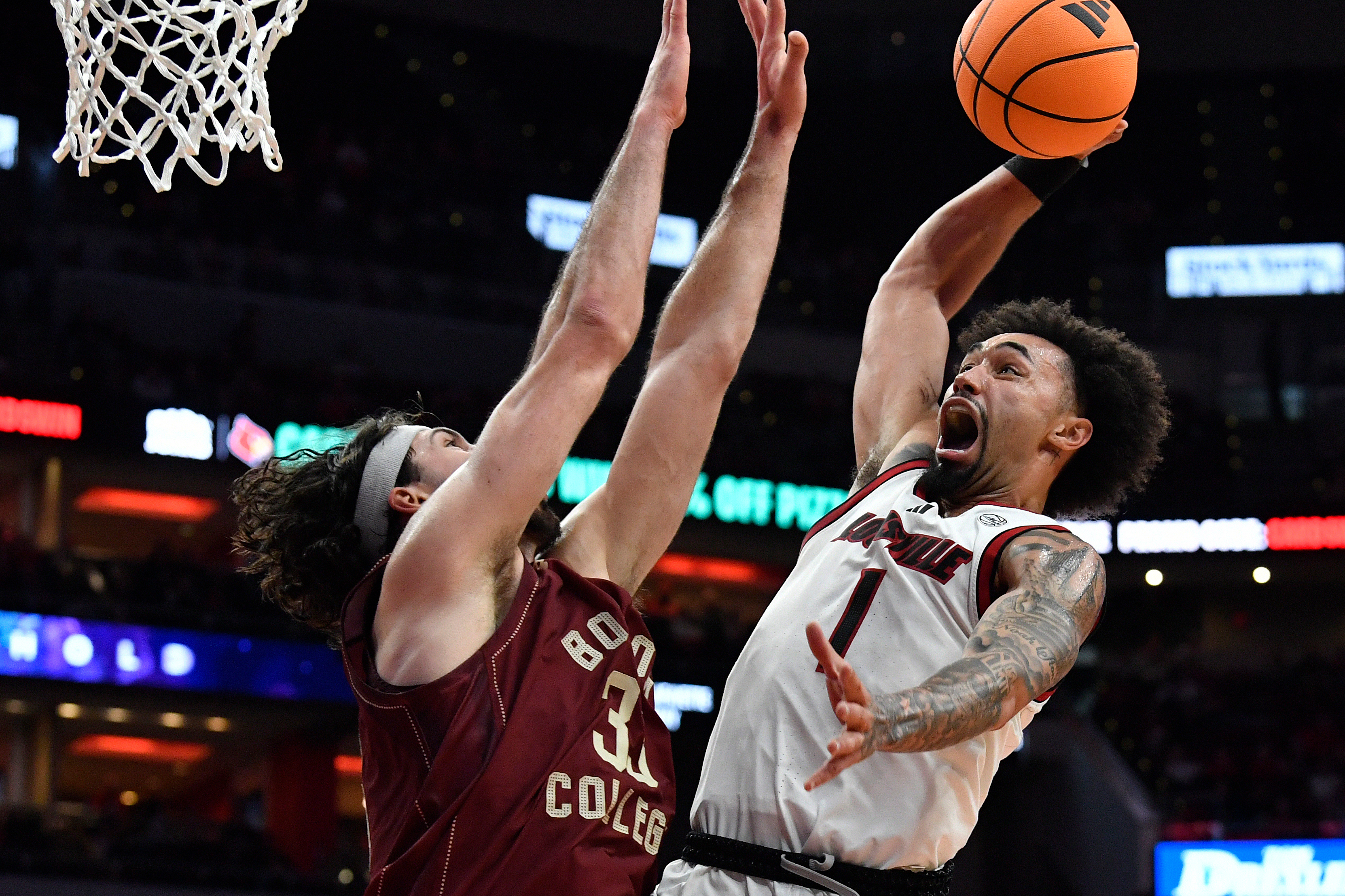 No. 20 Louisville beats Boston College 75-62 as ex-G League player London Johnson is made available