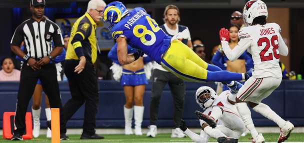 Stafford's late TD pass to Parkinson lifts the Rams past the Panthers 34-31 in the wild-card round