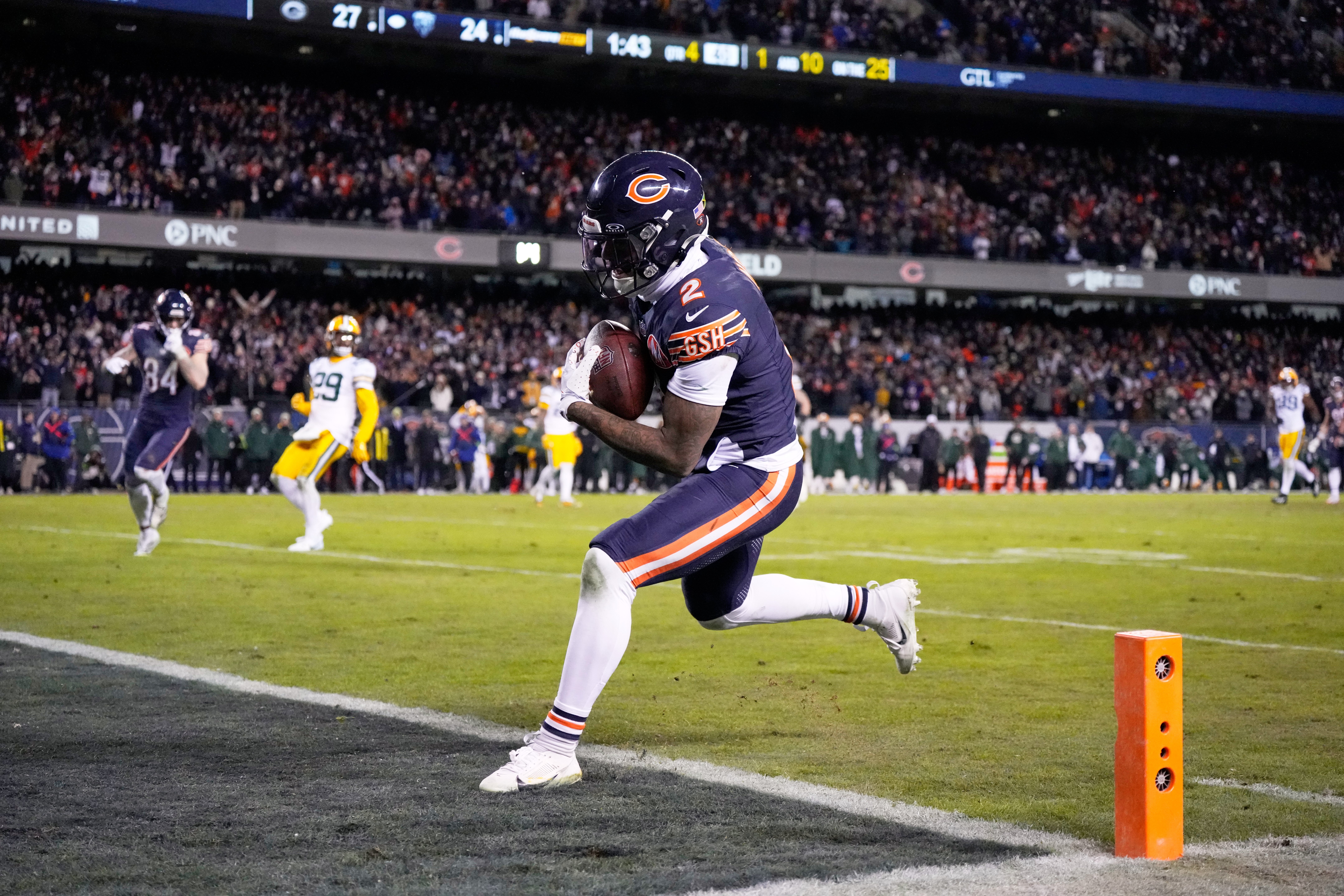 Chicago Bears' DJ Moore catches a touchdown pass during the second half of an NFL wild-card playoff football game against the Green Bay Packers Saturday, Jan. 10, 2026, in Chicago.