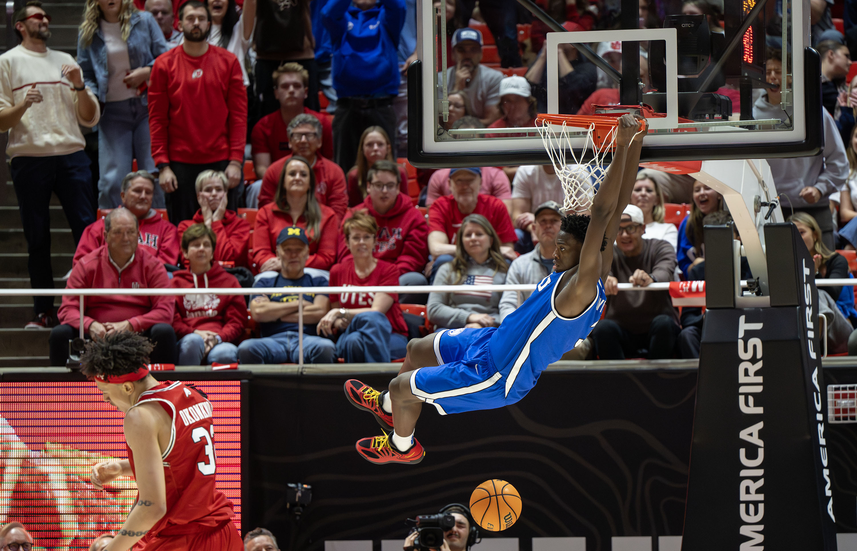 BYU forward AJ Dybantsa (3) dunks the ball as Utah and BYU play at the Huntsman Center in Salt Lake City on Saturday, Jan. 10, 2026.