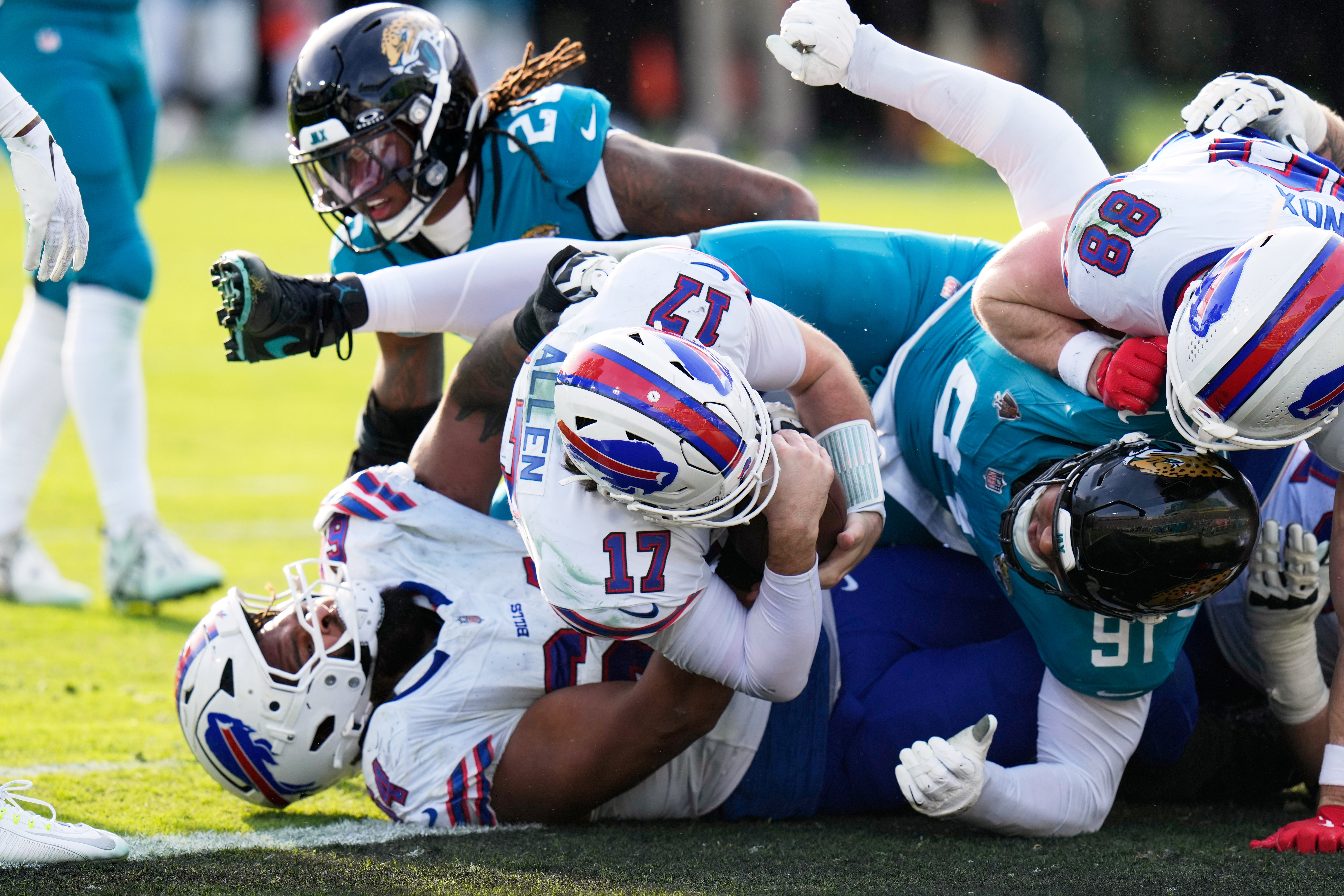 Josh Allen carries Bills to 27-24 win at Jags for Buffalo's first road playoff victory in 33 years