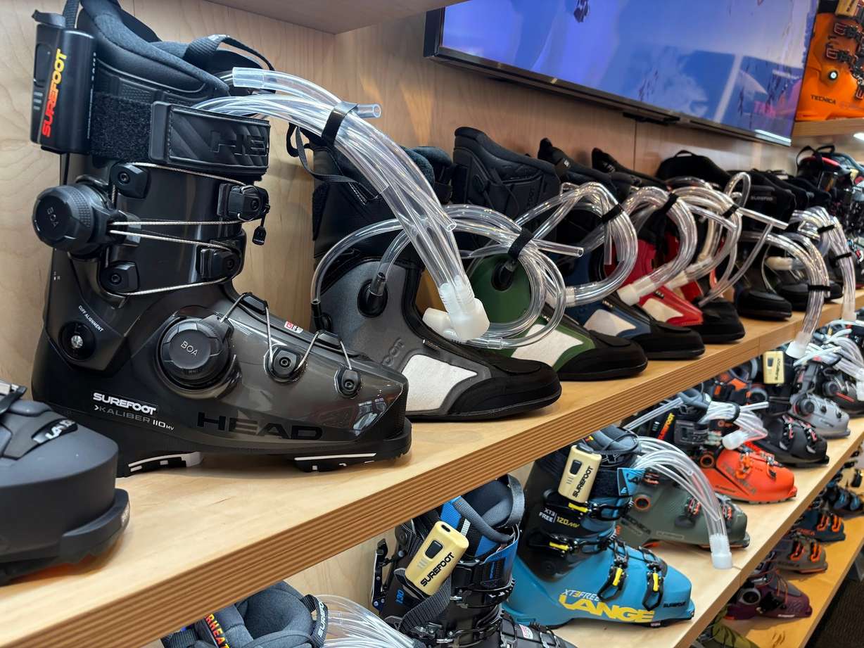 Ski boot shells at the Surefoot store in Park City wait to be injected with the gel-like foam that results in a custom fit.