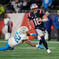 Maye throws late TD pass and Patriots' defense roughs up Herbert, Chargers in 16-3 playoff win