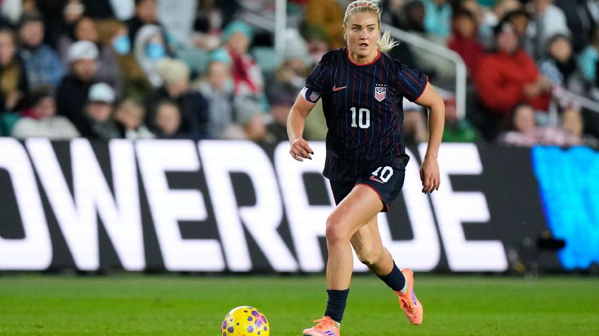 FILE - United States midfielder Lindsey Heaps kicks the ball during the second half of a women's international friendly soccer match against New Zealand, Wednesday, Oct. 29, 2025, in Kansas City, Mo.