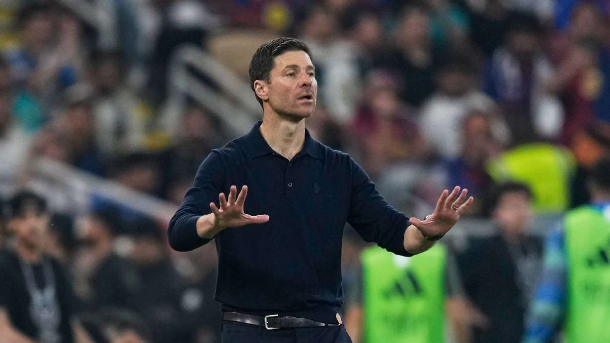 Real Madrid's head coach Xabi Alonso gestures during the Spanish Super Cup final soccer match against FC Barcelona at King Abdullah Sports City Stadium in Jeddah, Saudi Arabia, Sunday, Jan. 11, 2026.