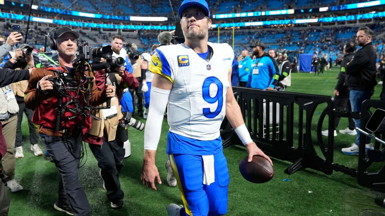 Los Angeles Rams quarterback Matthew Stafford (9) walks off the field after a win over the Carolina Panthers in an NFL wild-card playoff football game, Saturday, Jan. 10, 2026, in Charlotte, N.C.