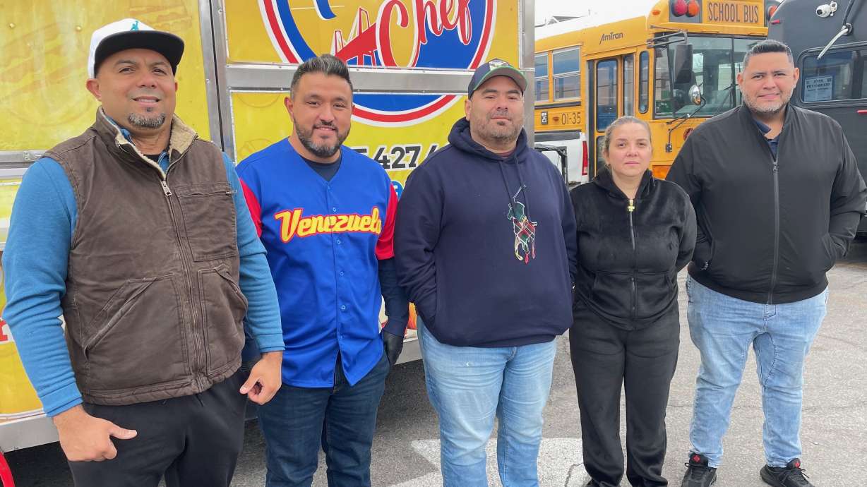 Members of Utah's Venezuelan community pose for a photo on Jan. 3, in Midvale, where they were discussing the removal earlier that day of Venezuelan President Nicolás Maduro by U.S. forces.
