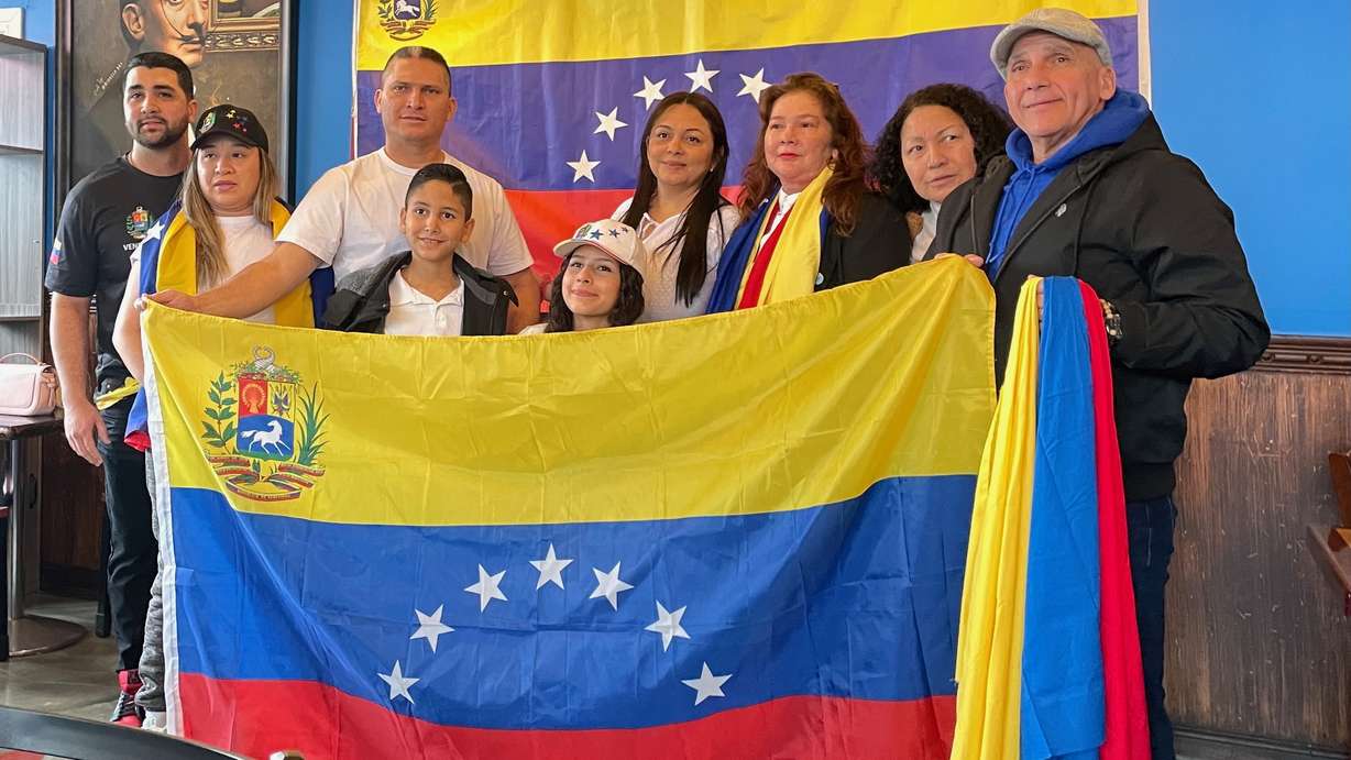 Members of Utah's Venezuelan community pose for a photo on Jan. 4, in Midvale at a gathering to celebrate the removal a day earlier of Venezuelan President Nicolás Maduro by U.S. forces.