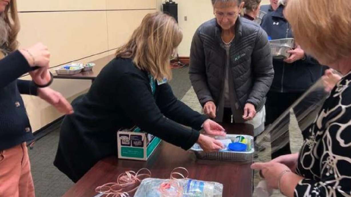 Volunteers assembling cake kits during a Saturday event hosted by JustServe at the Melaleuca Conference Center. Idahoans are invited to complete 250,000 acts of service through July 4 as America celebrates its 250th anniversary this year.
