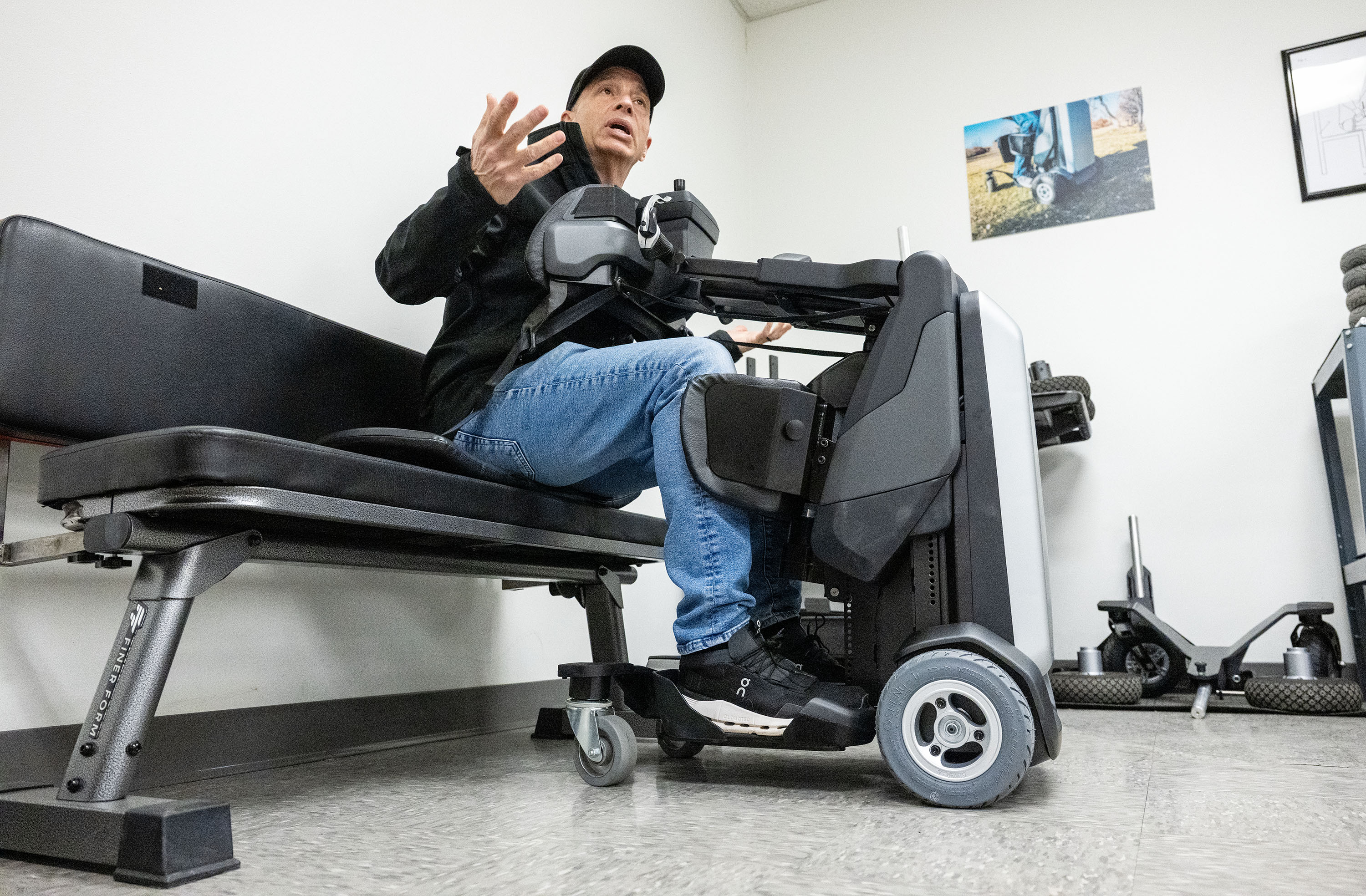 Steven Boal, CEO of Matia Mobility, a manufacturer of robotic standing wheelchairs, demonstrates how the Tek works with one of their units in Salt Lake City on Dec. 30, 2025.