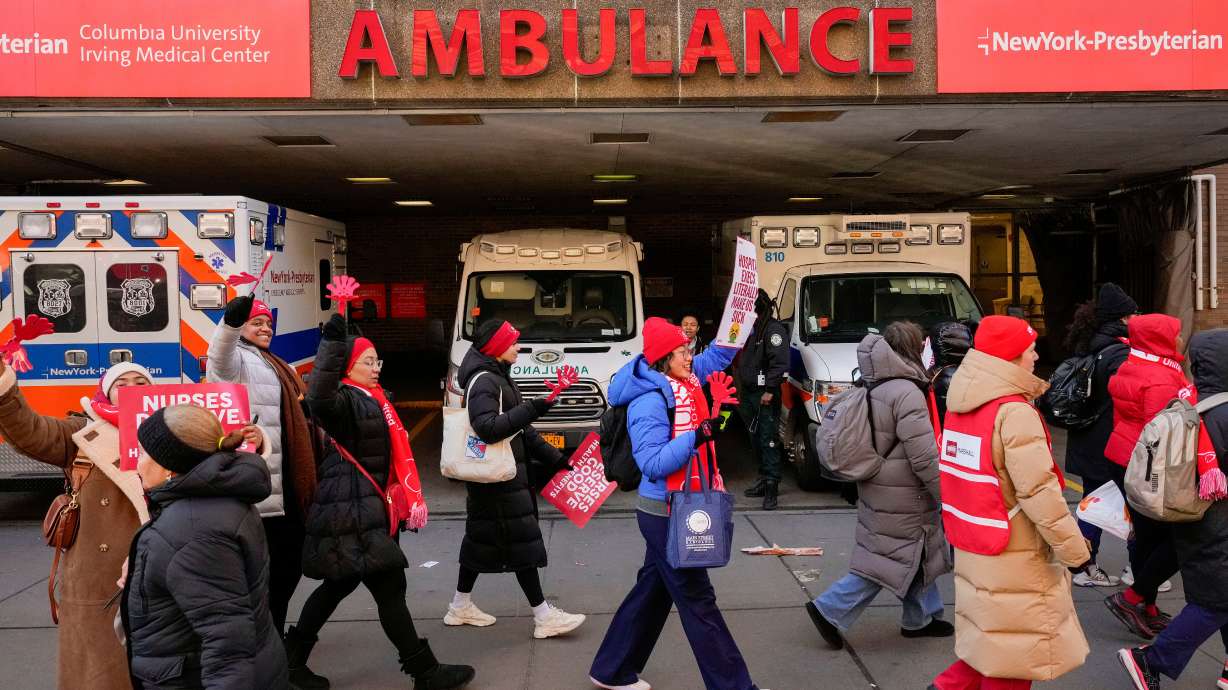 Nurses strike outside New York-Presbyterian Hospital on Monday in New York. Thousands of New York City nurses returned to the picket lines Tuesday as their strike targeting some of the city's leading hospital systems entered its second day.
