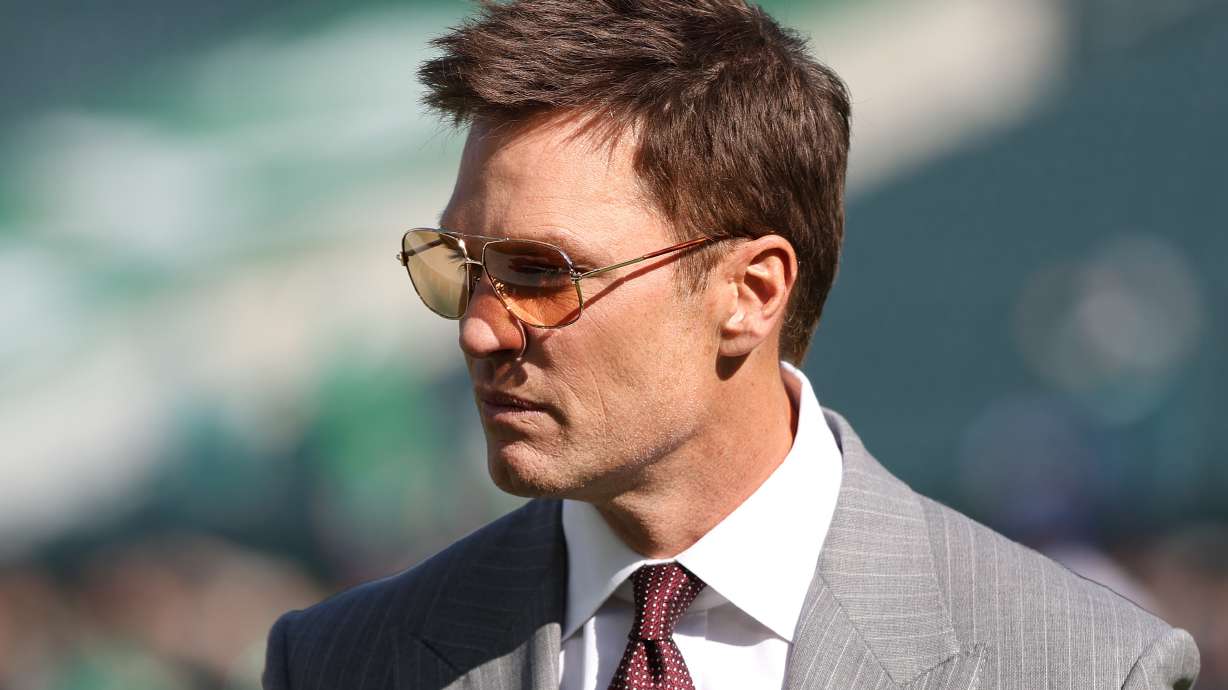 FILE - NFL analyst Tom Brady looks on before an NFL football game between the Philadelphia Eagles and the New York Giants, Oct. 26, 2025, in Philadelphia.