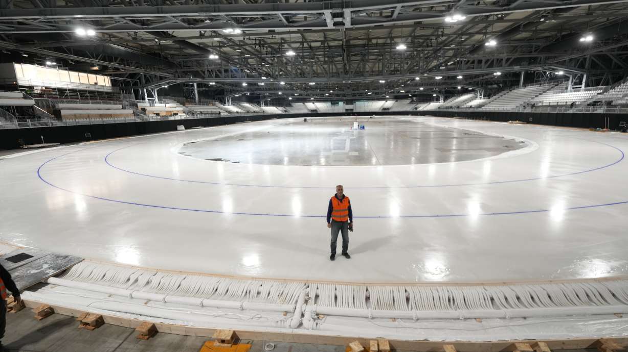 Ice Master Mark Messer poses in the stadium where speed skating discipline of the Milan Cortina 2026 Winter Olympics will take place, in Rho, outskirt of Milan, Tuesday, Nov. 11, 2025.