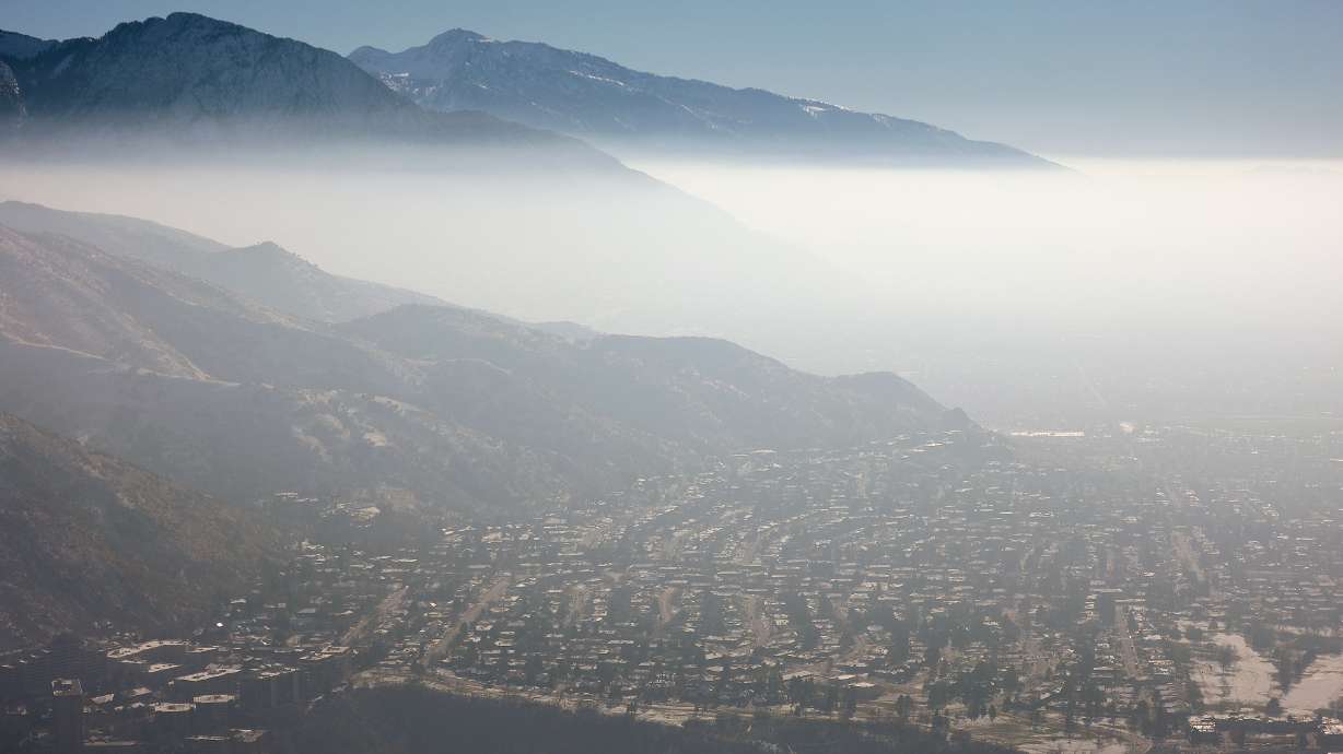 Smog blankets the Salt Lake valley during an inversion on Monday. Inversion conditions are expected across the Wasatch Front, possibly into next week, with the latest lull in storm activity.