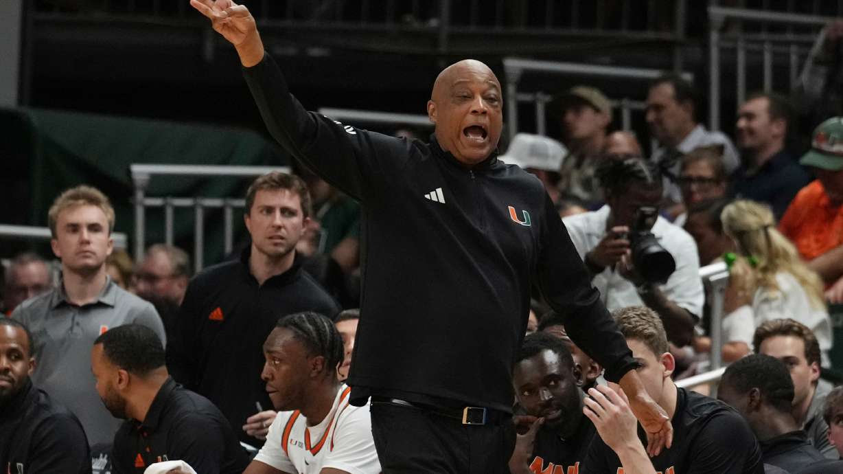 FILE - Miami head coach Bill Courtney gestures during the first half of an NCAA college basketball game against Duke, Tuesday, Feb. 25, 2025, in Coral Gables, Fla.