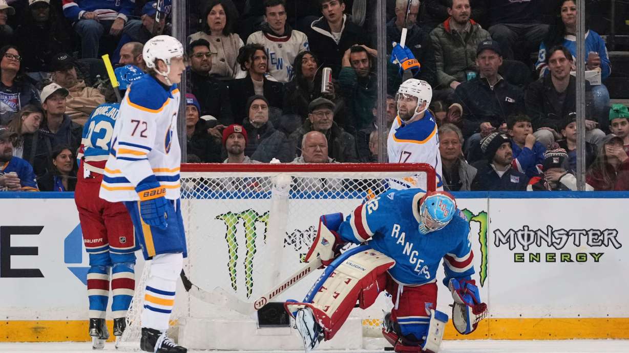 Buffalo Sabres' Jason Zucker (17) celebrates after scoring a goal as New York Rangers goaltender Jonathan Quick (32) reacts during the second period of an NHL hockey game Thursday, Jan. 8, 2026, in New York.
