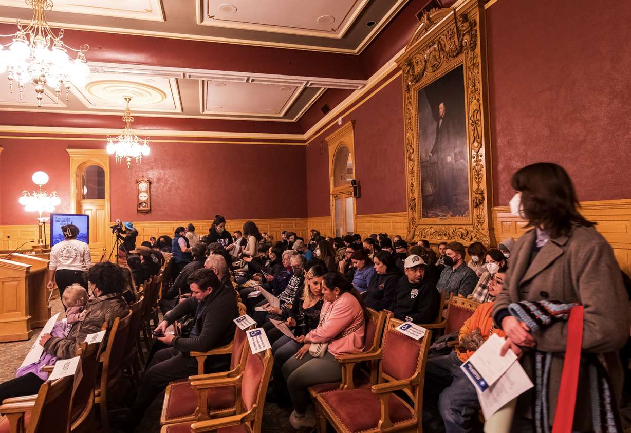 People show up before the Salt Lake City Council meeting at the Salt Lake City-County Building in Salt Lake City on Tuesday.