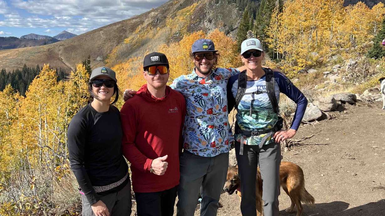 Wasatch Trails Foundation Executive Director Mia Yue, board members Ron Yerrick and Scott House and Mountain Trails Foundation Executive Director Lora Anthony pose on the new BLT to WOW Connector Trail.